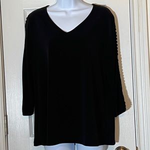 Susan Graver Black Liquid Knit top, crochet trim on 3/4“ sleeves.